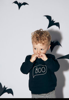 Boy wearing Halloween T-shirt and leggings set. Shop Halloween gifts