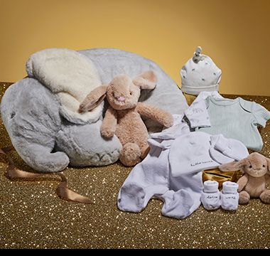 A selection of baby gifts, including cuddly toys and clothing. Shop now 