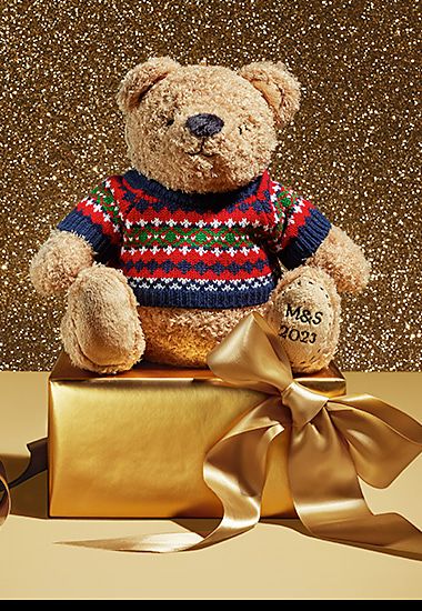 Spencer Bear plush teddy with knitted jumper and embroidered paw. Shop now 