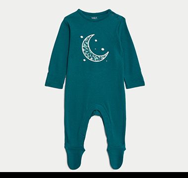 Green baby sleepsuit with Eid slogan. Shop now