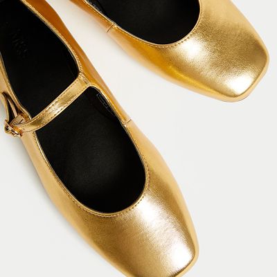 Gold Mary Jane-style ballet pumps. Shop now