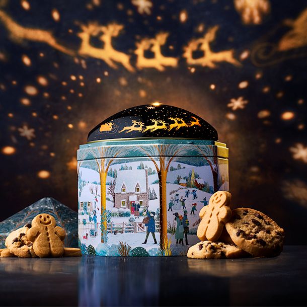 M&S light-up projector tin with biscuits and light projections