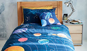 Wooden bed with children's bedding