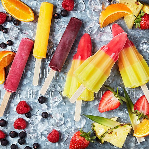 A selection of fruity and rocket lollies and fresh fruit