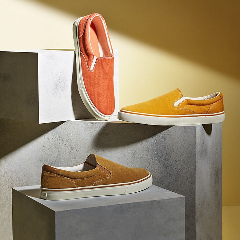Men’s slip-on pumps in coral pink, yellow and tan