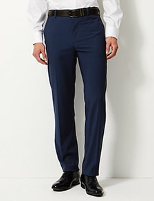 Man wearing navy blue tailored-fit trousers