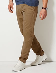 Man wearing slim fit chinos