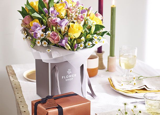 M&S flowers with chocolates, wine and candles