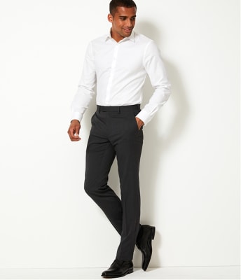Man wearing grey slim-fit trousers