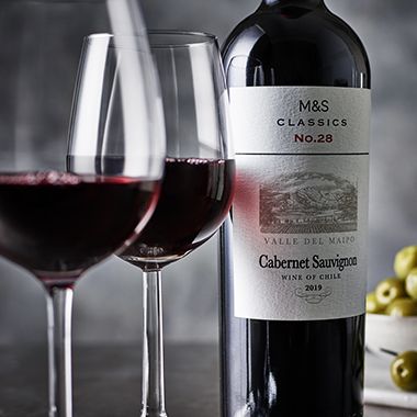 A bottle and glasses of Classics cabernet sauvignon