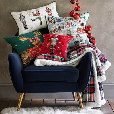 Home For Christmas Knitted Cushion By Sophie Allport