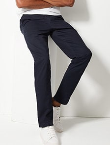 Man wearing tapered fit chinos