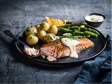 A fillet of Scottish salmon with asparagus and new potatoes