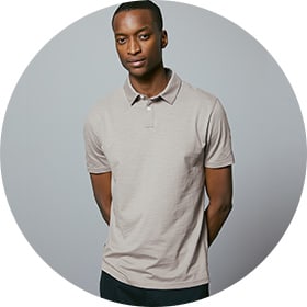 Man wearing grey polo shirt