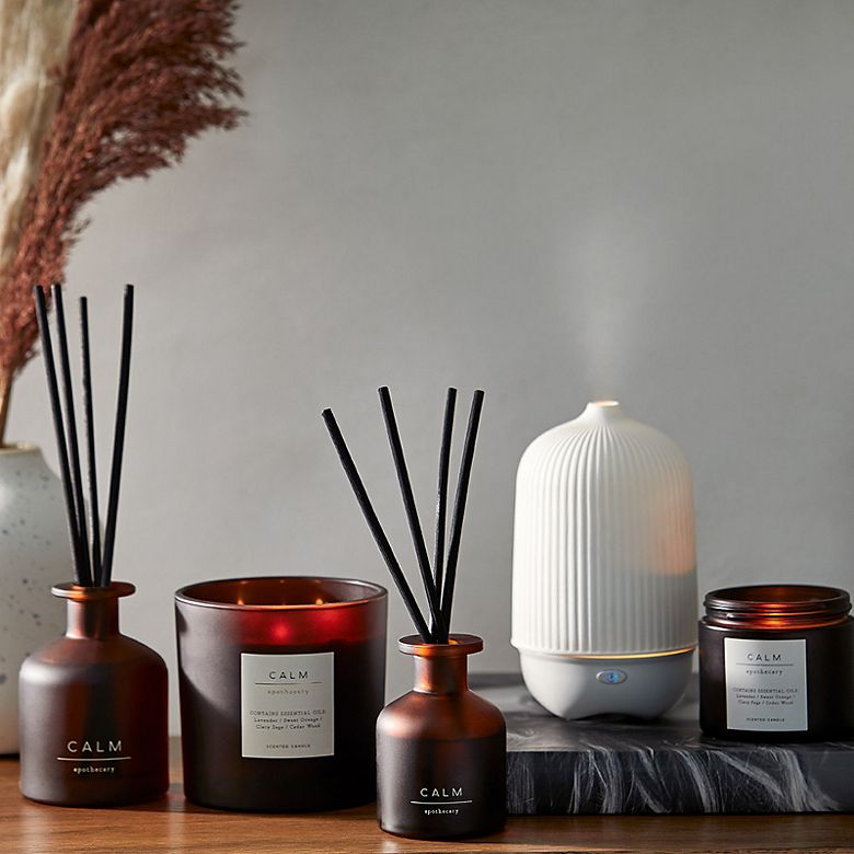 Selection of Apothecary diffusers and candles and an electric diffuser
