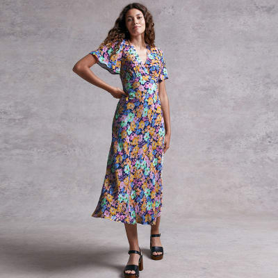 Woman wearing V-neck tea dress