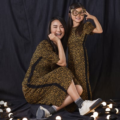 Animal print dress and jumpsuit for mum and daughter