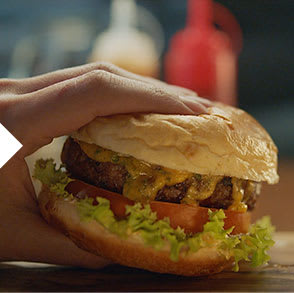 Our Best Ever burger with cheese in a soft bun with lettuce and tomato