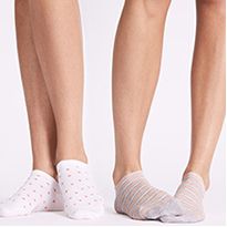 Women wearing patterned trainer socks