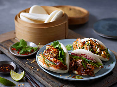 A plate of pork-filled bao buns