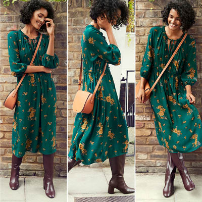 Our dress of the week is a green midi floral dress perfect for winter