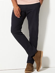 Man wearing tapered fit chinos