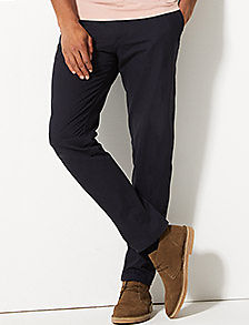Man wearing tapered fit chinos