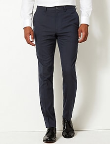 Man wearing navy blue skinny-fit trousers
