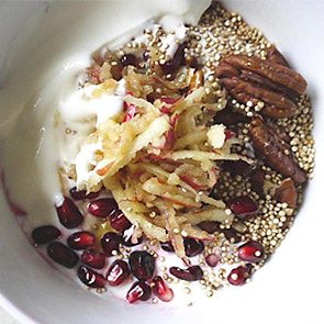 Yoghurt with puffed quinoa, pomegranate, pecans and apple