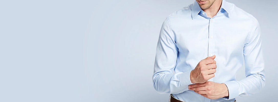 Man wearing pale blue formal shirt